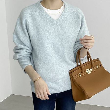 A selection of Dongdaemum Women’s Shirts & Tops, showcasing the best of Korean fashion.