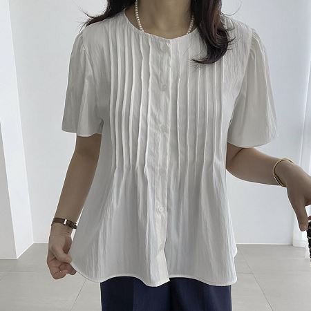 A selection of Dongdaemum Women’s Shirts & Tops, showcasing the best of Korean fashion.