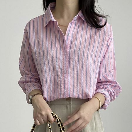 A selection of Dongdaemum Women’s Shirts & Tops, showcasing the best of Korean fashion.