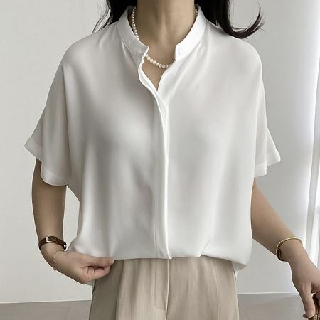 A selection of Dongdaemum Women’s Shirts & Tops, showcasing the best of Korean fashion.