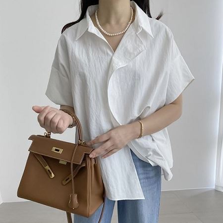 A selection of Dongdaemum Women’s Shirts & Tops, showcasing the best of Korean fashion.