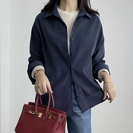 A selection of Dongdaemum Women’s Shirts & Tops, showcasing the best of Korean fashion.