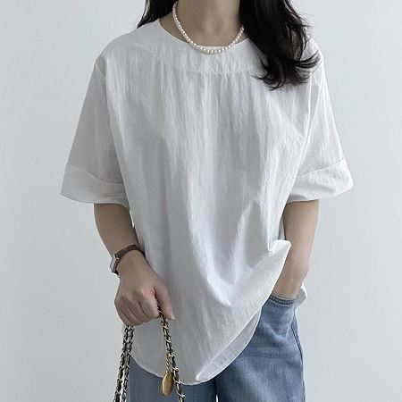 A selection of Dongdaemum Women’s Shirts & Tops, showcasing the best of Korean fashion.