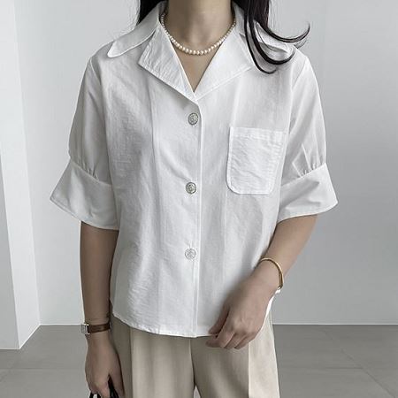 A selection of Dongdaemum Women’s Shirts & Tops, showcasing the best of Korean fashion.