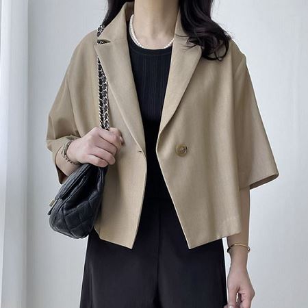 A variety of Dongdaemum Women’s Coats & Jackets, reflecting the sophistication of Korean fashion.