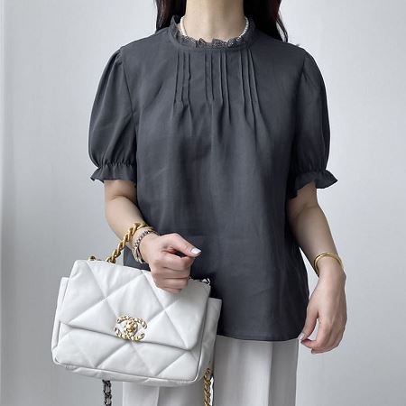 A selection of Dongdaemum Women’s Shirts & Tops, showcasing the best of Korean fashion.