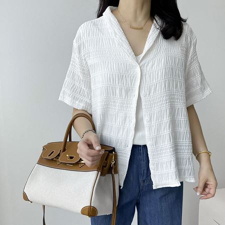 A selection of Dongdaemum Women’s Shirts & Tops, showcasing the best of Korean fashion.