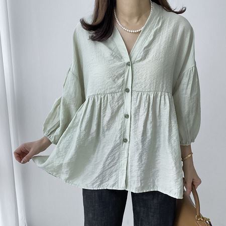 A selection of Dongdaemum Women’s Shirts & Tops, showcasing the best of Korean fashion.