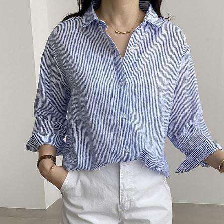 A selection of Dongdaemum Women’s Shirts & Tops, showcasing the best of Korean fashion.
