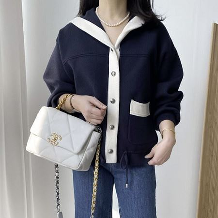 A variety of Dongdaemum Women’s Coats & Jackets, reflecting the sophistication of Korean fashion.