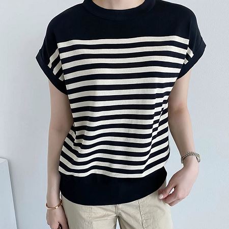 A selection of Dongdaemum Women’s Shirts & Tops, showcasing the best of Korean fashion.