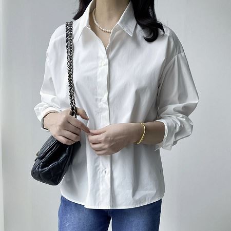 A selection of Dongdaemum Women’s Shirts & Tops, showcasing the best of Korean fashion.