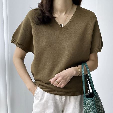 A selection of Dongdaemum Women’s Shirts & Tops, showcasing the best of Korean fashion.