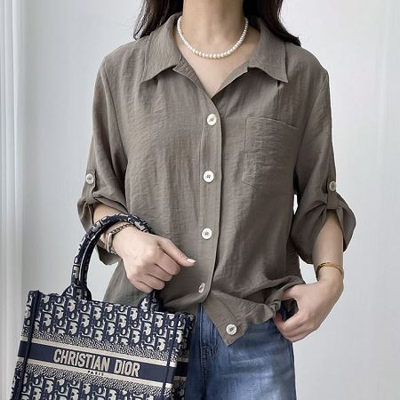 A selection of Dongdaemum Women’s Shirts & Tops, showcasing the best of Korean fashion.