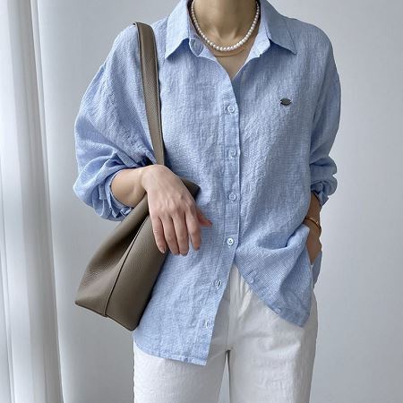 Dongdaemum Women’s Shirts, Tops & T-Shirts, a testament to the elegance and quality of wholesale Korean fashion.