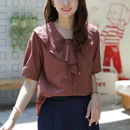 A selection of Dongdaemum Women’s Shirts & Tops, showcasing the best of Korean fashion.