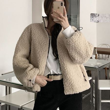 A variety of Dongdaemum Women’s Coats & Jackets, reflecting the sophistication of Korean fashion.