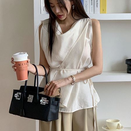 A selection of Dongdaemum Women’s Shirts & Tops, showcasing the best of Korean fashion.