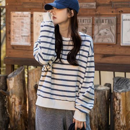 A selection of Dongdaemum Women’s Shirts & Tops, showcasing the best of Korean fashion.