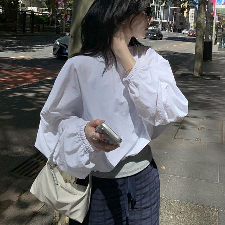 Dongdaemum Women’s Shirts, Tops & T-Shirts, a testament to the elegance and quality of wholesale Korean fashion.