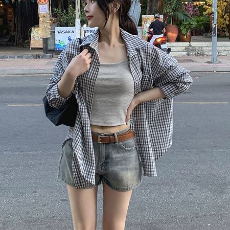 A selection of Dongdaemum Women’s Shirts & Tops, showcasing the best of Korean fashion.