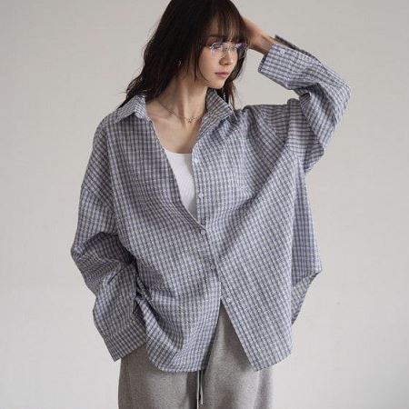 A selection of Dongdaemum Women’s Shirts & Tops, showcasing the best of Korean fashion.