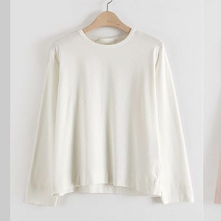 A selection of Dongdaemum Women’s Shirts & Tops, showcasing the best of Korean fashion.