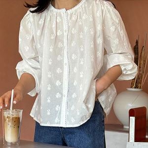 A selection of Dongdaemum Women’s Shirts & Tops, showcasing the best of Korean fashion.