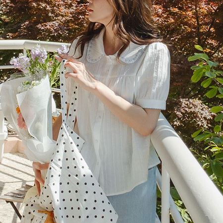 Dongdaemum Women’s Shirts, Tops & T-Shirts, a testament to the elegance and quality of wholesale Korean fashion.