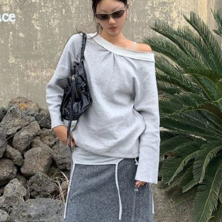Dongdaemum Women’s Shirts, Tops & T-Shirts, a testament to the elegance and quality of wholesale Korean fashion.