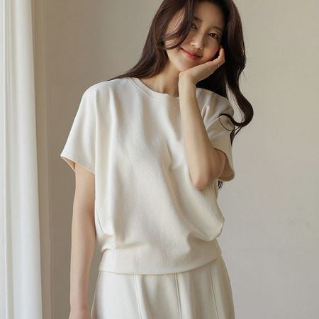 A selection of Dongdaemum Women’s Shirts & Tops, showcasing the best of Korean fashion.