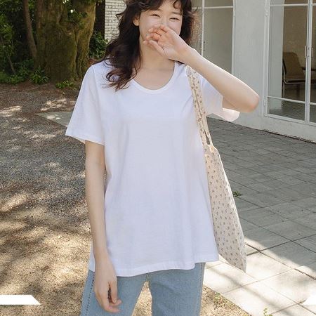 A selection of Dongdaemum Women’s Shirts & Tops, showcasing the best of Korean fashion.
