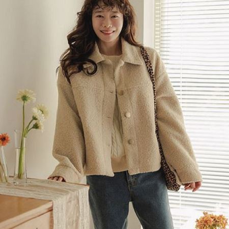 A variety of Dongdaemum Women’s Coats & Jackets, reflecting the sophistication of Korean fashion.