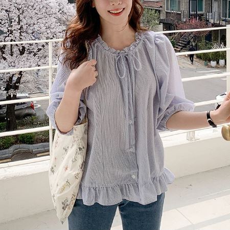 A selection of Dongdaemum Women’s Shirts & Tops, showcasing the best of Korean fashion.