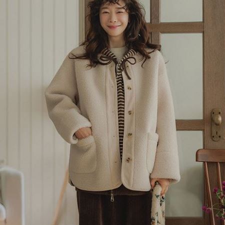 A variety of Dongdaemum Women’s Coats & Jackets, reflecting the sophistication of Korean fashion.