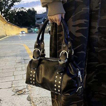 A collection of Dongdaemum Women’s Handbags, Wallets & Cases, showcasing the elegance of Korean fashion.