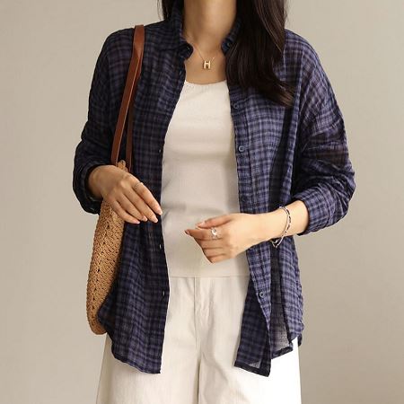 A selection of Dongdaemum Women’s Shirts & Tops, showcasing the best of Korean fashion.
