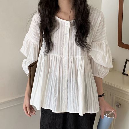 Dongdaemum Women’s Shirts, Tops & T-Shirts, a testament to the elegance and quality of wholesale Korean fashion.