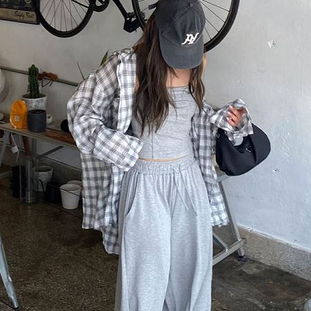 A selection of Dongdaemum Women’s Shirts & Tops, showcasing the best of Korean fashion.