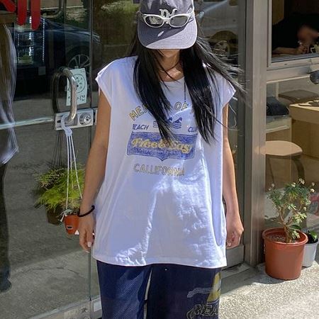 A selection of Dongdaemum Women’s Shirts & Tops, showcasing the best of Korean fashion.