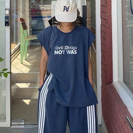 A selection of Dongdaemum Women’s Shirts & Tops, showcasing the best of Korean fashion.
