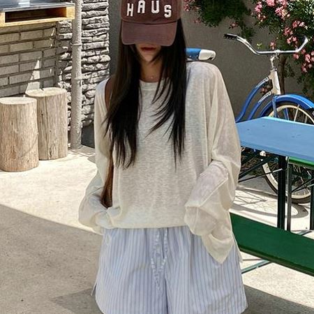 A selection of Dongdaemum Women’s Shirts & Tops, showcasing the best of Korean fashion.